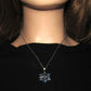 https://www.artistryjewelry.net/products/lovely-blue-winter-snowflake-necklace