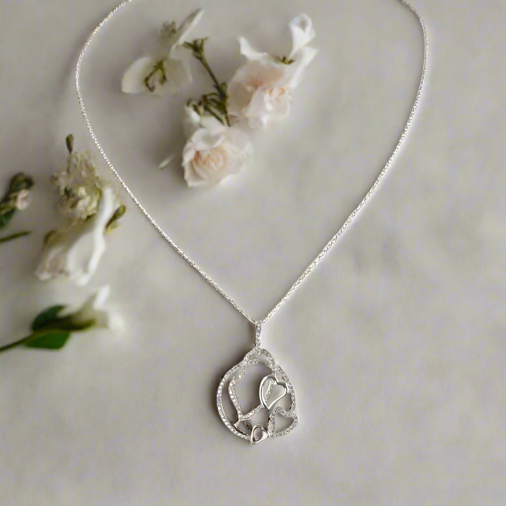 https://www.artistryjewelry.net/products/multi-heart-necklace