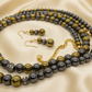 Original jewelry reference with soft gold satin background
