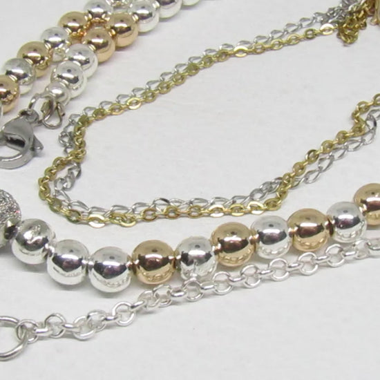 https://www.artistryjewelry.net/products/beautiful-silver-and-gold-hematite-necklace