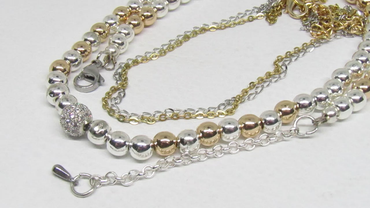 https://www.artistryjewelry.net/products/beautiful-silver-and-gold-hematite-necklace