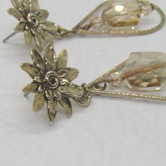 https://www.artistryjewelry.net/products/swarvorski-golden-shadow-earrings