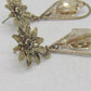 https://www.artistryjewelry.net/products/swarvorski-golden-shadow-earrings