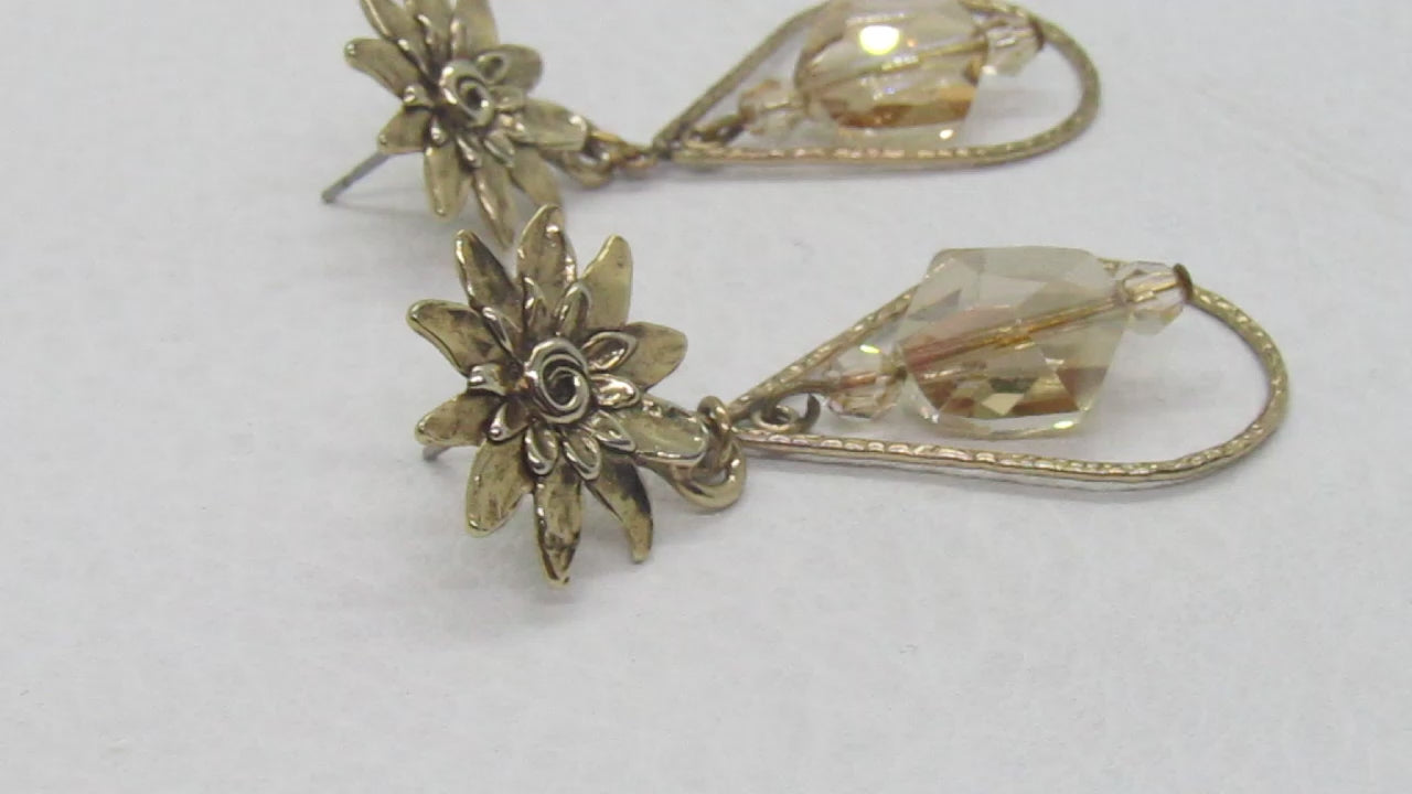 https://www.artistryjewelry.net/products/swarvorski-golden-shadow-earrings