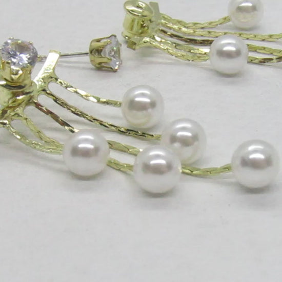 https://www.artistryjewelry.net/products/crystal-and-pearl-hanging-ear-jackets