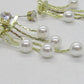 https://www.artistryjewelry.net/products/crystal-and-pearl-hanging-ear-jackets