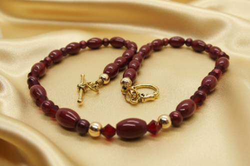 https://www.artistryjewelry.net/products/lovely-burgundy-surprise-necklace