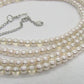 Beautiful Light Peach, Stardust, and Pearl, Two-Strand Beaded Necklace handcrafted by Artistry Jewelry