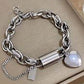 https://www.artistryjewelry.net/products/exciting-silver-heart-and-chain-bracelet