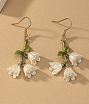 https://www.artistryjewelry.net/products/precious-white-flower-dangle-earrings