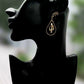 https://www.artistryjewelry.net/products/swarvorski-golden-shadow-earrings